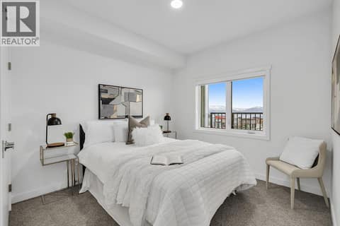 Third Bedroom. Photos may be of a similar home in the community. at 1057 Frost Road Unit# 301, Upper Mission, Kelowna