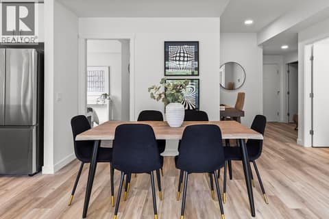 Dining Room. Photos may be of a similar home in the community. at 1057 Frost Road Unit# 302, Upper Mission, Kelowna
