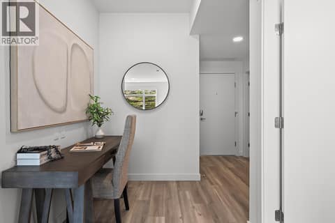 Foyer with Nook. Photos may be of a similar home in the community. at 1057 Frost Road Unit# 302, Upper Mission, Kelowna