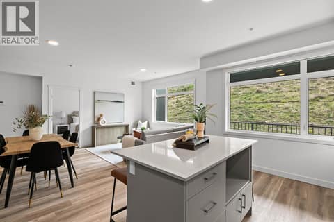 Kitchen, Living and Dining Room. Photos may be of a similar home in the community. at 1057 Frost Road Unit# 302, Upper Mission, Kelowna