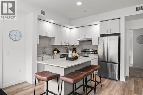Kitchen. Photos may be of a similar home in the community. at 1057 Frost Road Unit# 302, Upper Mission, Kelowna