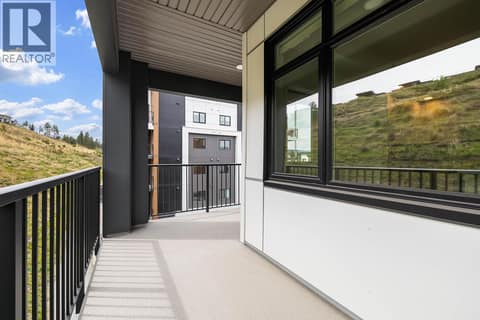 Patio. Photos may be of a similar home in the community. at 1057 Frost Road Unit# 302, Upper Mission, Kelowna