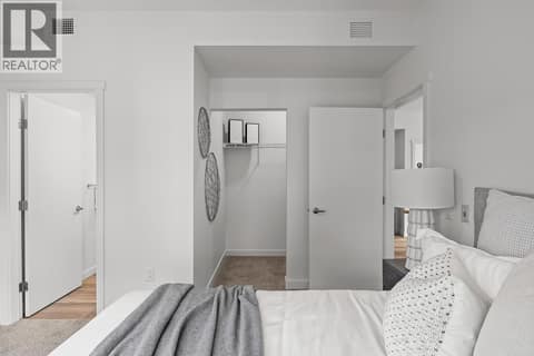 Primary Bedroom. Photos may be of a similar home in the community. at 1057 Frost Road Unit# 302, Upper Mission, Kelowna
