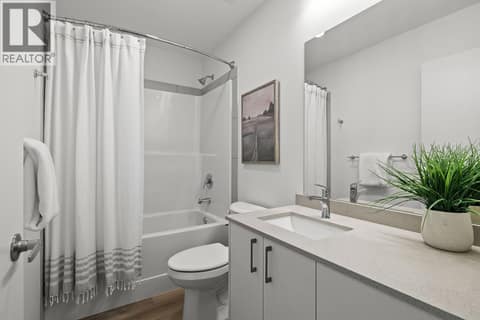 Second Bathroom. Photos may be of a similar home in the community. at 1057 Frost Road Unit# 302, Upper Mission, Kelowna