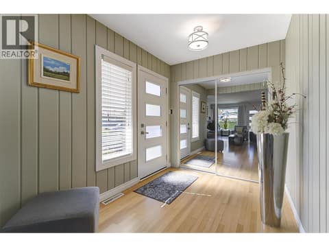 Spacious Foyer entry with generous coat closet space at 1296 Kelglen Crescent, Glenmore, Kelowna