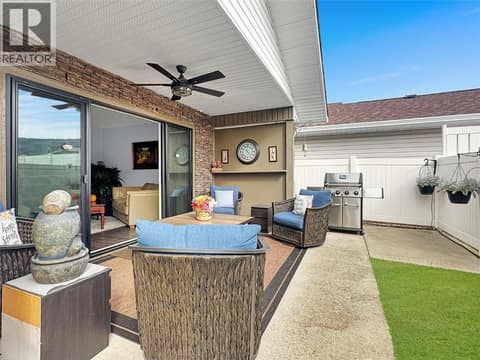 Backyard off family room at 6526 TUCELNUIT Drive Unit# 40, Oliver