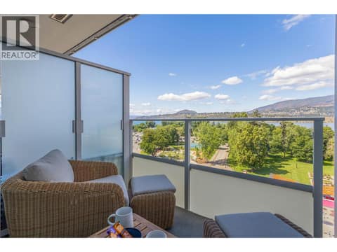 Guests enjoy morning coffee on their private deck at 238 Leon Avenue Unit# 808, Kelowna North