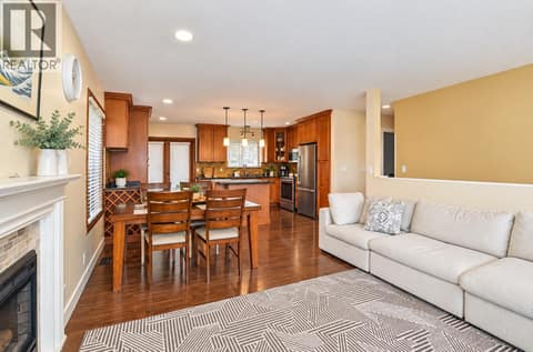 Living Room to Kitchen at 10590 Long Road, Lake Country South West
