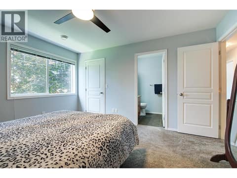 Primary Bedroom with Walk-in closet at 788 Rutland Road N Unit# 6, Rutland North, Kelowna
