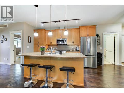 Lovely kitchen with large island, stainless steel appliances at 511 Yates Road Unit# 110, North Glenmore, Kelowna