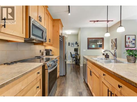 Lovely kitchen with large island, stainless steel appliances at 511 Yates Road Unit# 110, North Glenmore, Kelowna