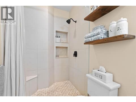 Main floor full bathroom at 5100 Haynes Road, North BX, Vernon