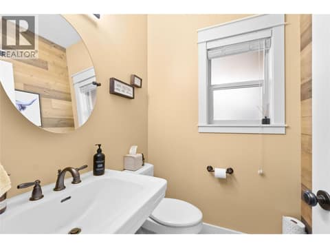 Main floor powder room at 5100 Haynes Road, North BX, Vernon