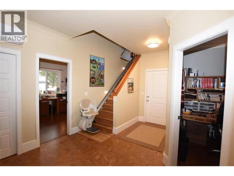 Door to garage and stairs to bonus room above the garage at 430 Hummingbird Avenue, Okanagan North, Vernon