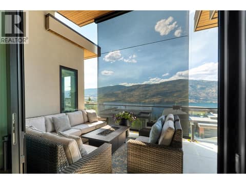 Power blind at 538 Clifton Court, Glenmore, Kelowna