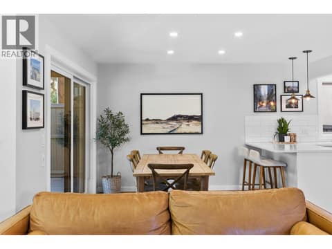 Dining room overlooking backyard at 905 Paret Crescent, Lower Mission, Kelowna
