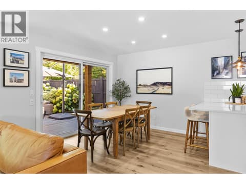Dining room overlooking backyard at 905 Paret Crescent, Lower Mission, Kelowna