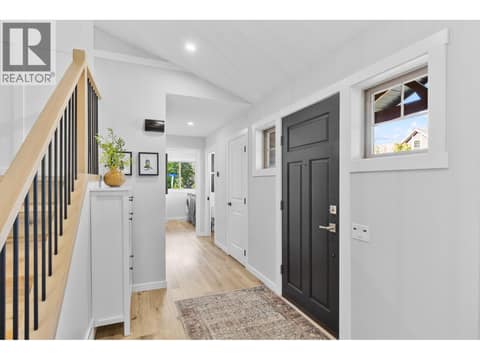Front entry with shoe cabinet at 905 Paret Crescent, Lower Mission, Kelowna