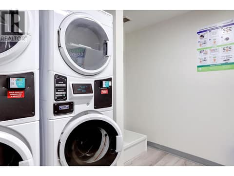 Coin Laundry just steps down the hall from the unit at 2555 Lakeshore Road Unit# 419, Okanagan Landing, Vernon