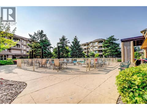 Outdoor Pool Area at 1964 Enterprise Way Unit# 413, Dilworth Mountain, Kelowna