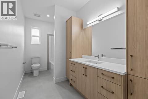 2nd floor bathroom. Photo of opposite side unit at 662 Birch Avenue Unit# 4, Kelowna South