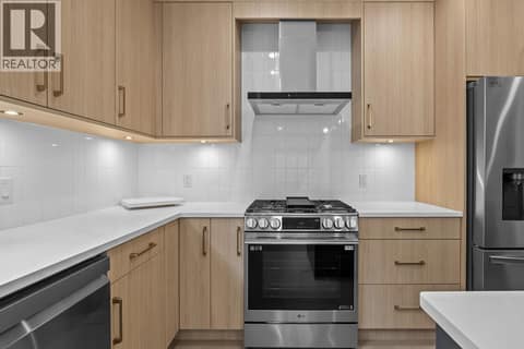 Fabulous kitchen finishing. Photo of opposite side unit at 662 Birch Avenue Unit# 4, Kelowna South