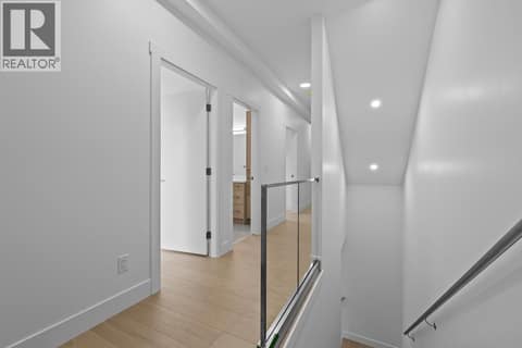 Moving to the second floor bedrooms/bathroom. Photo of opposite side unit at 662 Birch Avenue Unit# 4, Kelowna South