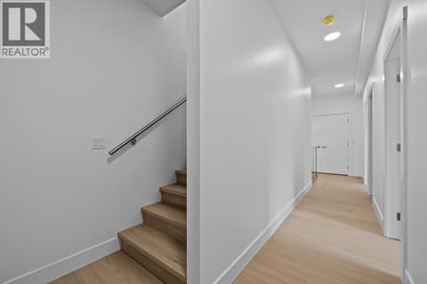 Top floor. Photo of opposite side unit at 662 Birch Avenue Unit# 4, Kelowna South