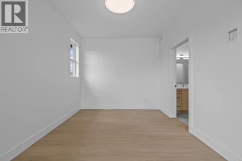 Top floor. Photo of opposite side unit at 662 Birch Avenue Unit# 4, Kelowna South
