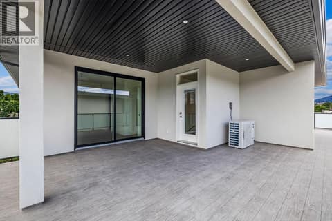 Upper Primary suite patio deck. at 662 Birch Avenue Unit# 4, Kelowna South