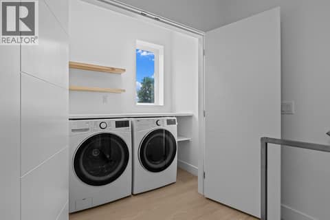 Separate laundry room. at 662 Birch Avenue Unit# 2, Kelowna South