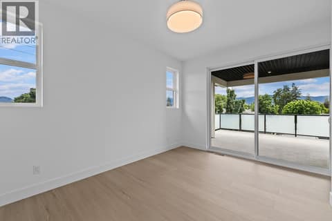 Top floor primary suite to deck. at 662 Birch Avenue Unit# 2, Kelowna South