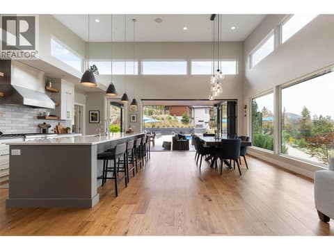 Open Concept - enjoy lake views while cooking and dining at 1740 Granite Road, Lake Country South West