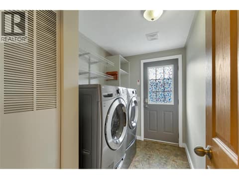 Laundry / Mudroom and Side Entrance at 6688 Tronson Road Unit# 114, Okanagan Landing, Vernon