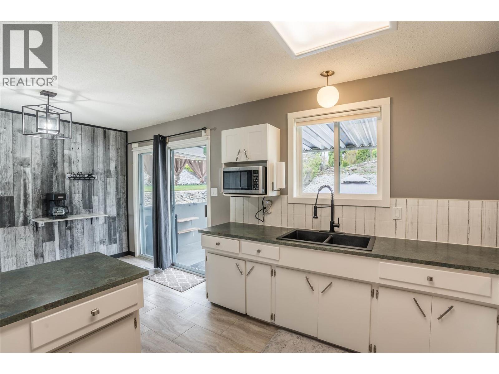 Photo 9 of 12408 CAMPBELL Crescent, Main Town, Summerland