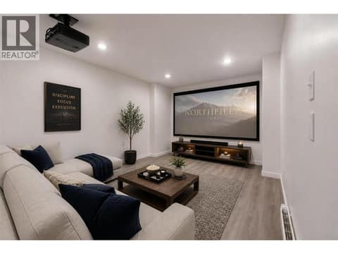 Family room virtually staged at 10824 Westshore Road, Okanagan North, Vernon
