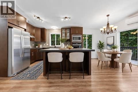 Kitchen virtually staged at 10824 Westshore Road, Okanagan North, Vernon