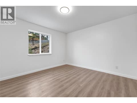 Primary bedroom at 10824 Westshore Road, Okanagan North, Vernon