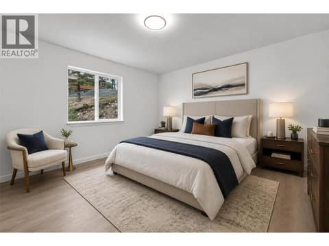 Primary bedroom virtually staged at 10824 Westshore Road, Okanagan North, Vernon