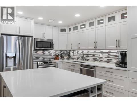 Kitchen Island with wine bar and storage at 2777 Casa Loma Road Unit# 207, Lakeview Heights, West Kelowna
