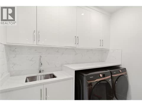 Laundry room on upstairs main level at 647 Deans Drive, Black Mountain, Kelowna