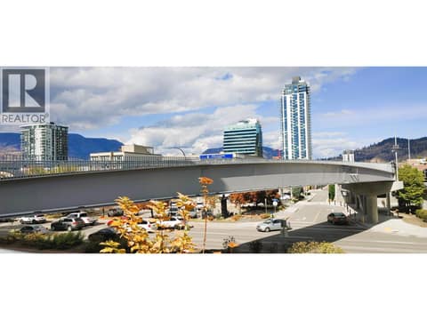 6 minute walk to Pedestrian Bridge over Hwy 97 at 625 Rowcliffe Avenue Unit# 207, Kelowna South