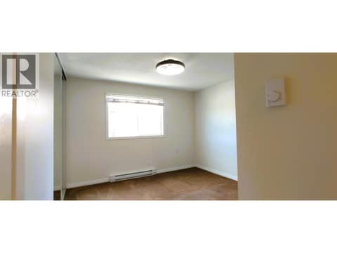 Primary Bedroom at 625 Rowcliffe Avenue Unit# 207, Kelowna South