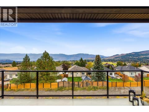 180 degree views of the mountains and lake at 2815 Copper Ridge Drive, Smith Creek, West Kelowna