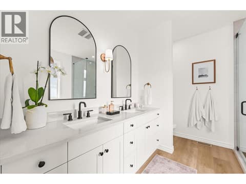 The ensuite complete with a double sink vanity at 2815 Copper Ridge Drive, Smith Creek, West Kelowna