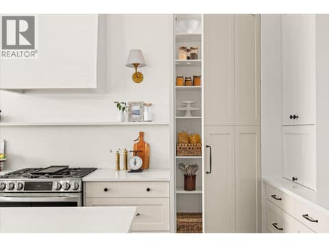 The kitchen’s own custom pantry! at 2815 Copper Ridge Drive, Smith Creek, West Kelowna