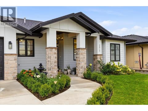 This home is perfect for a family looking to rightsize, or a couple wanting main floor living. at 2815 Copper Ridge Drive, Smith Creek, West Kelowna