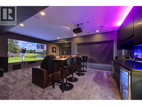 Motorized blackout blinds, custom Hue lighting, 135"" screen and a HD laser projector. at 2151 Madera Court, Westbank Centre, West Kelowna