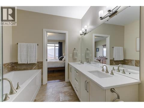 Vanity countertops upgraded to match the kitchen. at 2151 Madera Court, Westbank Centre, West Kelowna