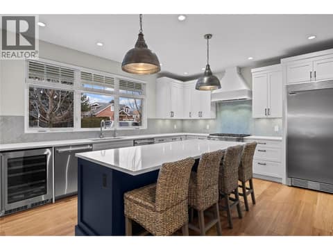 Enough room for everyone to pitch in and cook and there's a large pantry. at 2050 Long Street, Kelowna South